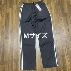レディース　アディダス　Mサイズ ウォームアップウインドブレーカーパンツ
