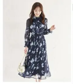 tocco２ＷＡＹボウタイリボン付きフラワープリントシャーリングプリーツワンピ