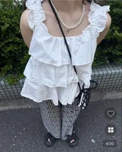 Ptiée プティエ フリルティアードギャザーフリルトップス ウナ una