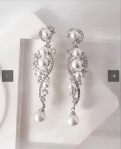 STELLA BRIDAL リボン 星 モチーフ ピアス - メルカリ