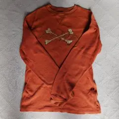 オレンジ 骨模様 長袖カットソー