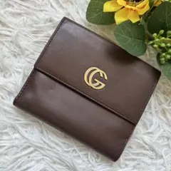 グッチ GGマーモント ゴールドダブルGロゴ コンパクト 二つ折り財布 ブラウンのサムネイル