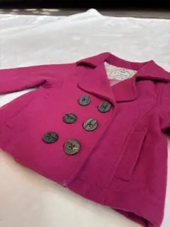 ピンク色コート