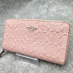 極美品　コーチ　アコーディオンジップウォレット　シグネチャー　エンボス ピンク