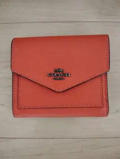 COACH 二つ折り財布 オレンジ レザーのサムネイル