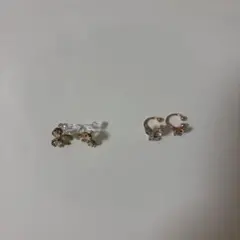 りぼんのイアリングとちょうちょのイヤーカフ