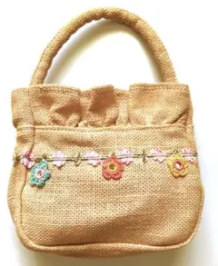 ピンク色のミニバッグ　麻（たぶん）で出来たワンハンドル刺繍が可愛いです