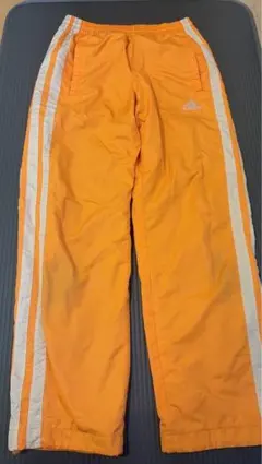 adidas オレンジ ストレートパンツ