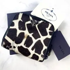 【希少】PRADA 折り財布 トライアングルロゴ ハラコ ゼブラ ファスナーのサムネイル
