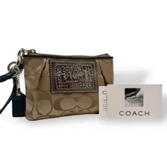 新品未使用級 コーチ ポピー リストレットポーチ 小物入れ シグネチャー柄