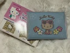 ハローキティ シークレットレザーポーチ　日焼けキティ　水色ポーチ