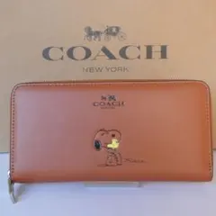 【新品】COACH コーチ　長財布　スヌーピーコラボ　ピンク　F53773 限定品】正規品COACHとスヌーピーが夢のコラボで実現！収納性抜群の