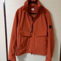 CP COMPANY オレンジ マウンテンパーカー - メルカリ