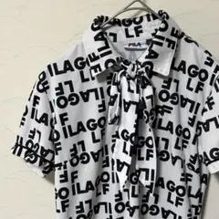 FILA GOLF 半袖ポロシャツ リボン総柄 レディースS 白黒のサムネイル