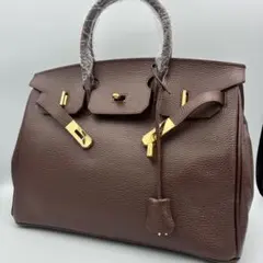 ハンドバッグ カデナ　南京錠 ブラウン シボ革 M＆K TOKYO 新品 ハンドバッグ カデナ 南京錠 ブラウン シボ革 M＆K TOKYO 新品 - メルカリ