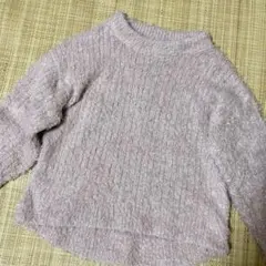 淡いピンクのリブ編み長袖セーター