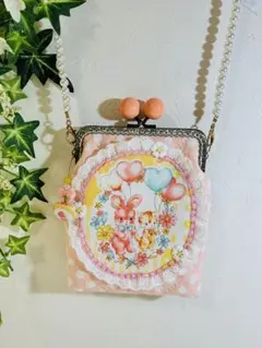 がま口ポシェット✩.*ハローベイビー薄橙✩.*パッチワーク✩.*ハンドメイド