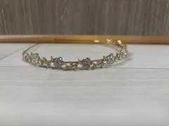 ゴールド 花モチーフ カチューシャ