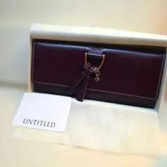 UNTITLED 長財布 ダークパープル タッセル付きのサムネイル