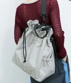 ADAM ET ROPE' LE CERCLE 巾着型リュック ショルダーグレーのサムネイル