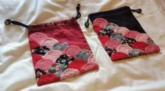 刺繍巾着袋 赤と黒の波模様