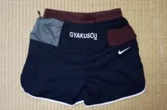名作 NIKE × GYAKUSOU ランニングショーツ M 黒黄 - メルカリ