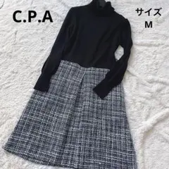 C.P.A タートルネックのニットとAラインツイードスカートのコンビネーション