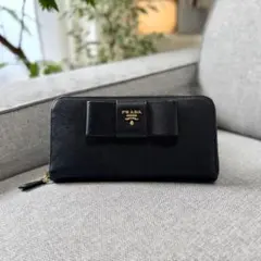 プラダ サフィアーノ フィオッコ ラウンドファスナー 長財布 リボンモチーフ