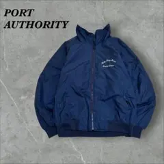 463]PORT AUTHORITYフルジップウォームアップナイロン ジャケット