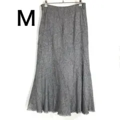 ヘリンボーンパターンのロングスカート　グレー　マーメイドフレア　裾フリンジ　M
