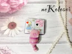 アリスの絵本を読むチェシャ猫 チャーム/ストラップ サージカルステンレス アリスの絵本を読むチェシャ猫 チャーム/ストラップ サージカル