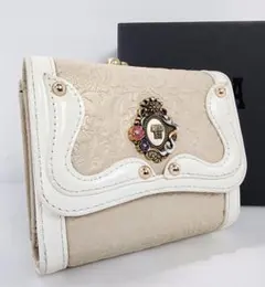 【美品】アナスイ 折り財布 セルパン 蛇モチーフ がま口 凹凸エンボスレザー