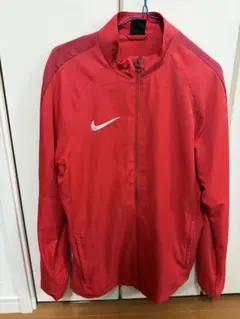 NIKE ウィンドブレーカー レッド - メルカリ