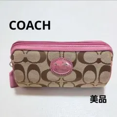 COACH ポーチ ハート柄 ピンク - メルカリ