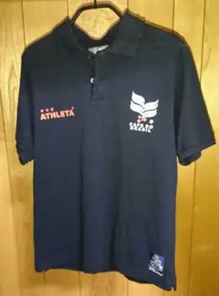 ATHLETA × RATTLE TRAP コラボ ポロシャツのサムネイル