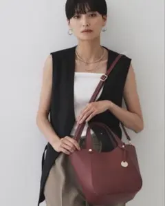 OPAQUE.CLIP コインカシメシュリンクミドルトートのサムネイル