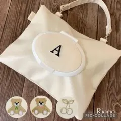 イニシャル入り　　ストラップ付き生成おしりふきポーチ