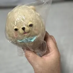 ベージュのクマのぬいぐるみ