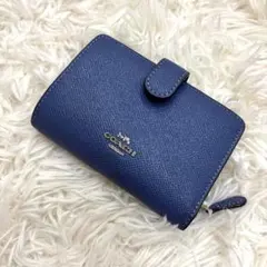COACH コーチ 二つ折り財布 PVC ライトブルー シグネチャー 金具ロゴ