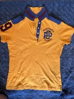 パーリーゲイツのオレンジが鮮やかなポロシャツです