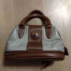 クリーム色と茶色のミニボストン型ハンドバッグ