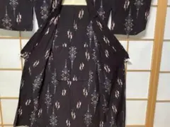 絣　着物　単　手縫い　黒地　着物リメイクのサムネイル