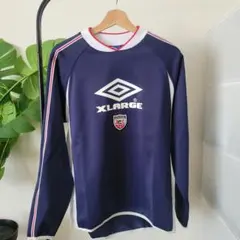 XLARGE×UMBRO PRACTICE L/S SHIRT
