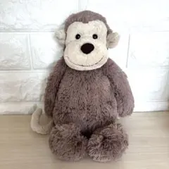 ヘッドフォン付きサルのぬいぐるみ - メルカリ