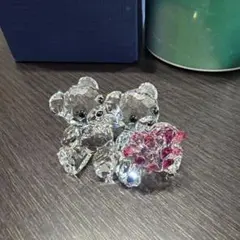 Swarovski クリスタルクマの置物 透明 赤いリボン - メルカリ