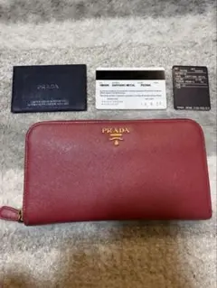 プラダ 長財布 サフィアーノ パパイヤ オレンジ 1M0506 箱・ギャラ付