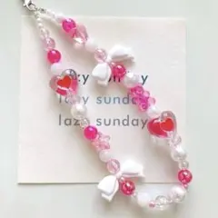 ハンドメイド໒꒱⋆ビビットピンク ハート 白リボン ビーズ ストラップ 推し活