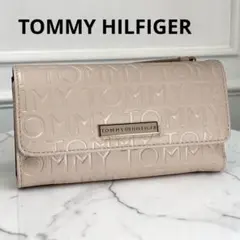 トミーヒルフィガー 長財布 エンボスロゴ ピンクベージュ ロゴプレート 大容量のサムネイル