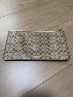 COACH ベージュ ロゴポーチ