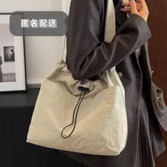 ショルダーバッグ 斜めかけ 巾着 ナイロン ベージュ 軽量 コンパクト 人気